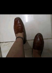 White Redtape Sneakers and brown loafers