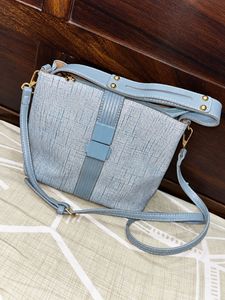 Chic Light Blue Textured Handbag