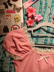 Pink lacey top with a bow