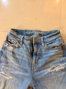 Distressed Blue Denim Jeans
