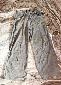 gray boot cut trouser, used. colour faded.