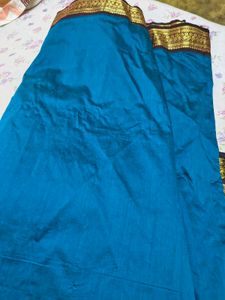Elegant Teal Saree with Gold Border