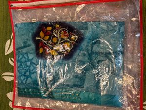 Beautiful Teal Saree with Embellishments