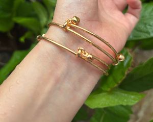 Elegant Gold Bangles with Red Stones