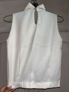 Sleeveless White Top with Black Lace Detail