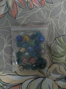 Bag of colorful glass marbles