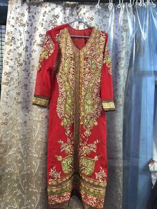 Festive wear red Pakistani suit with chudidar pant