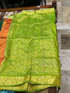 Beautiful Orange Saree with Green Border