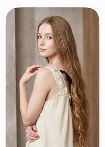 Chic Cream Ruffled Top with Bow Detail