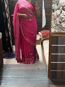 Elegant Pink Saree with Golden Detailing