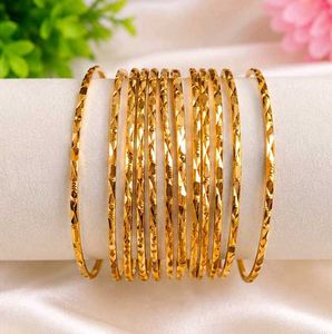 Set of 12 Elegant Gold Bangles