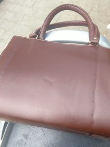 Stylish Brown Handbag with Bear Charm