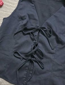 Sleeveless V-Neck Tie-Up Top from savana