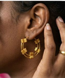 Golden Hoop Earrings with Unique Design