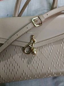Chic Taupe Textured Handbag with Scarf Accent