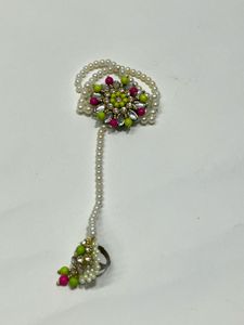 Pearl bracelet with attached ring