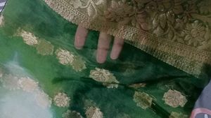 Elegant Green Saree with Golden Border
