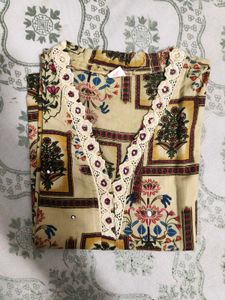 Elegant Printed Kurta with Lace Detail