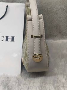 Coach Moon with charm&amp; Carry bag