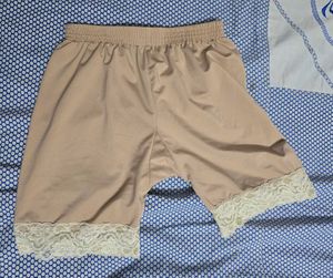 Nude color laced shorts