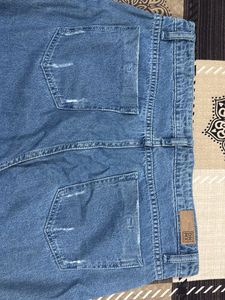 Light Blue Distressed Denim Jeans