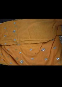 Embellished orange Saree