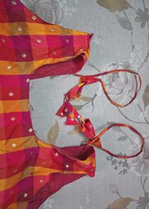 Vibrant Plaid Blouse with Gold Dots