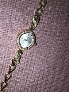 Elegant Gold Tone Watch with Rhinestones