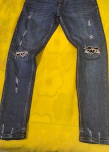 Distressed Blue Denim Jeans