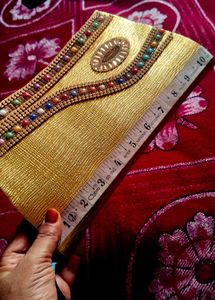 Elegant Gold Embellished Clutch Bag