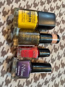 4 Nailpaints... Yellow, Plum ,Red, Shimmery Copper