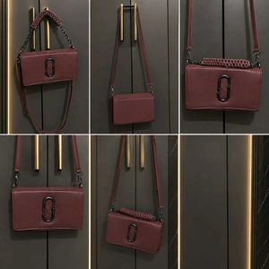 brown sling bag