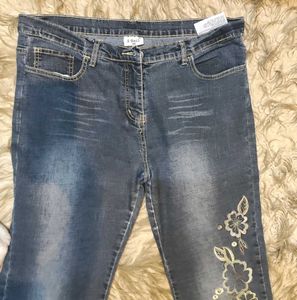 Whimsical Floral Embroidered Denim Jeans