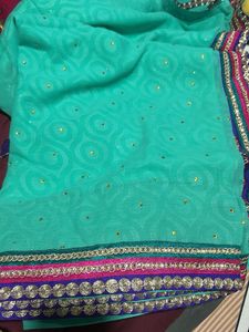 Beautiful Teal Saree with Embellished Border
