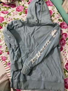 Light Blue Hoodie with Graphic Sleeve