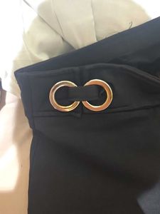 Chic Black Pants with Gold Detail