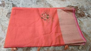 Elegant Orange Saree with Tassels