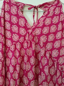 Pink Printed Tie-Up Neck Sleeveless Short Kurti