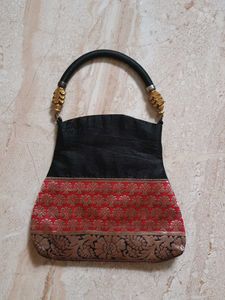 Exquisite Handcrafted Black & Red Clutch