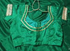 Elegant Green Saree with Embellished Border