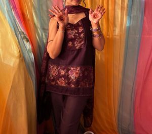 stitched purple floral kurta and bell bottom set