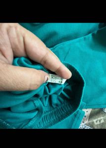 Elegant Teal Kurta Set with Intricate Embroidery