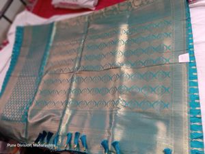 Elegant Teal and Gold Brocade Saree