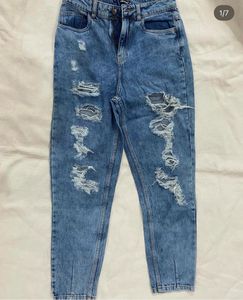 Distressed Blue Denim Jeans