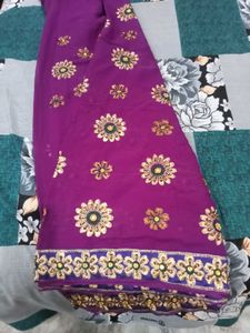 Elegant Purple Saree with Embellishments