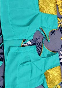 Elegant Teal Saree with white Diamond type Pattern