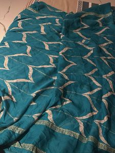Teal saree with leaf design