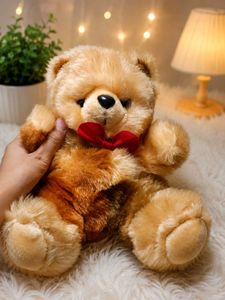 Cute Teddy Bear with Red Bowtie