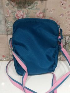 Wildcraft Pink &amp; Blue Sling Bag