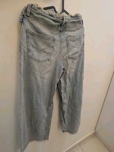 Distressed Denim Jeans with Fringe Detail